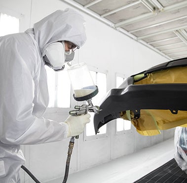 Collision Center Technician Painting a Vehicle | Van-Trow Toyota in Monroe LA