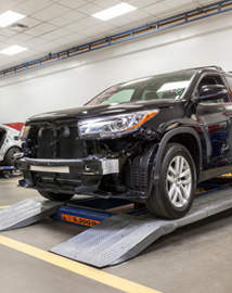 Toyota on vehicle lift | Van-Trow Toyota in Monroe LA